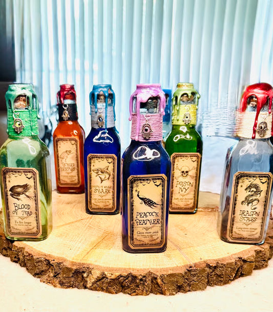 Medium Potion Bottles ~ 6”H x 2”W. Glass is heavy & thick